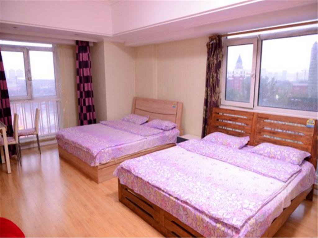 Green Express Apartment Harbin West Railway Station Habitación foto